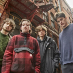 MANCHESTER RISING BAND HOLLY HEAD CHAT NEW SINGLE, BBC6 MUSIC AND WRITING FROM A JAIL CELL