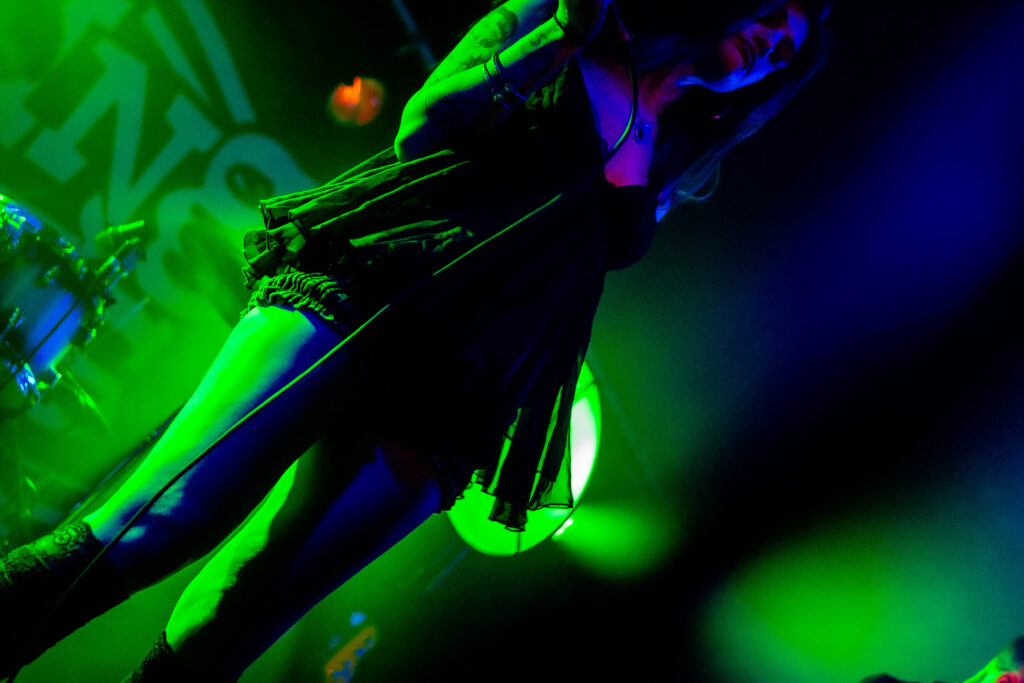 front woman, kenzi of bottle rockets performing in king tuts